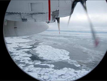 Broken Arctic sea ice as seen from a window in from a U.S. Coast Guard C130 flight over the Arctic Ocean September 30, 2009